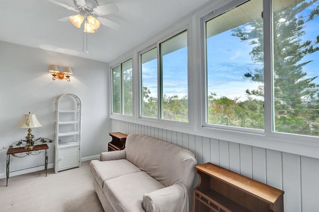 sunroom with ceiling fan