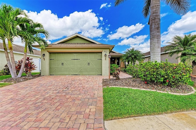 ranch-style home with a garage