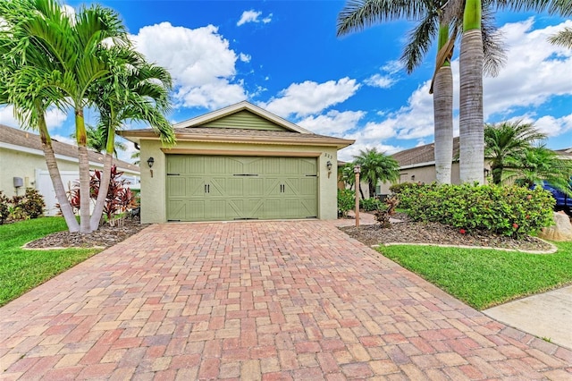 view of front of home with a garage