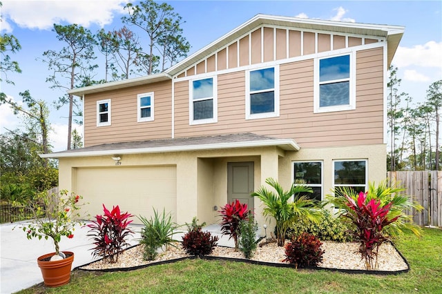 view of front of home with a garage