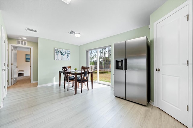 dining area featuring light hardwood / wood-style floors