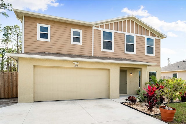 view of front of property featuring a garage