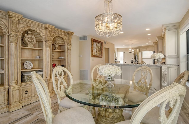 dining room with visible vents, a notable chandelier, and recessed lighting