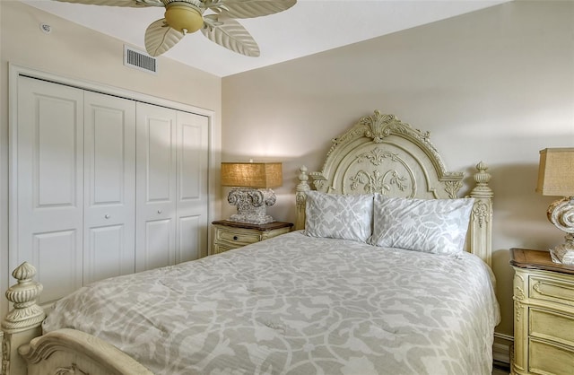 bedroom featuring a closet, visible vents, and a ceiling fan