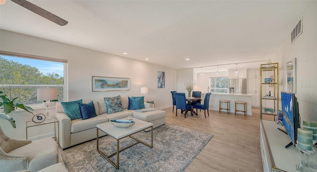 living room with light wood-type flooring