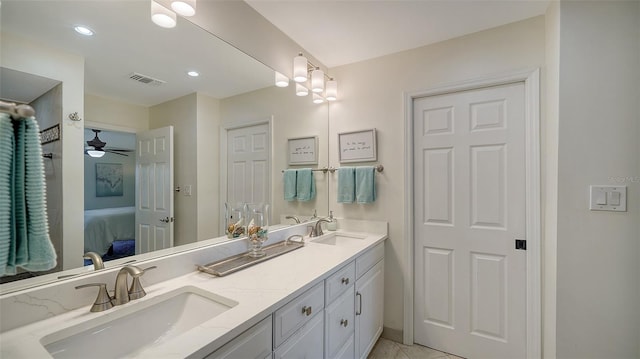 bathroom with vanity and ceiling fan