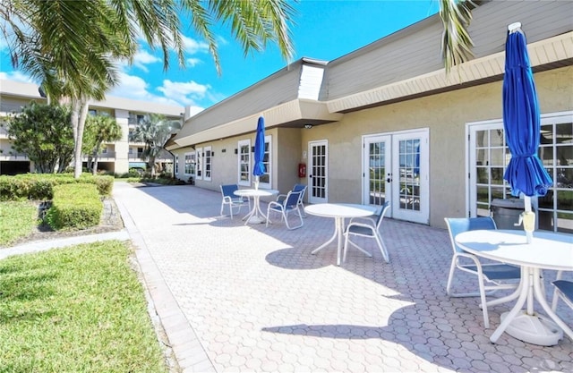 view of patio featuring french doors