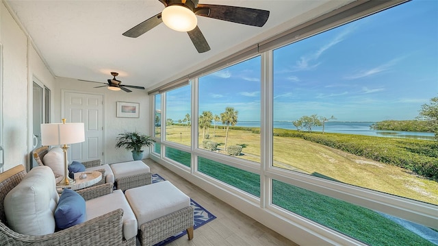 sunroom with a water view