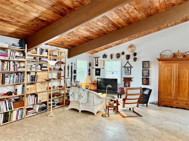 sitting room with wooden ceiling and lofted ceiling with beams