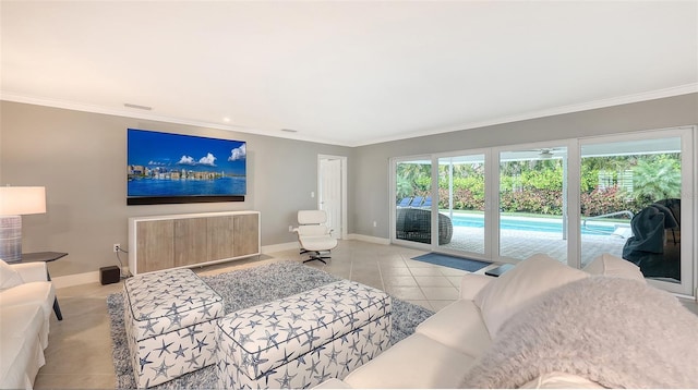 tiled living room featuring a wealth of natural light and crown molding