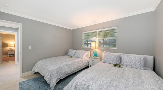 bedroom featuring light tile patterned flooring and crown molding