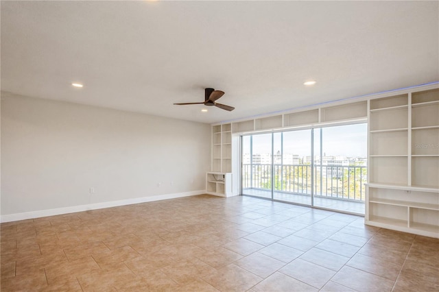 tiled empty room featuring built in shelves and ceiling fan