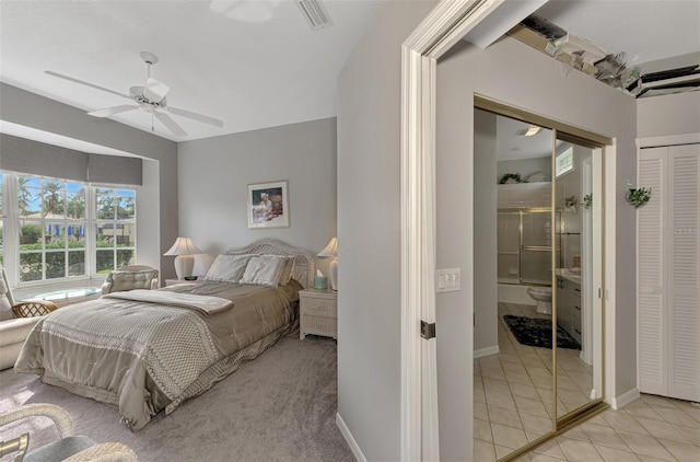 tiled bedroom with ceiling fan