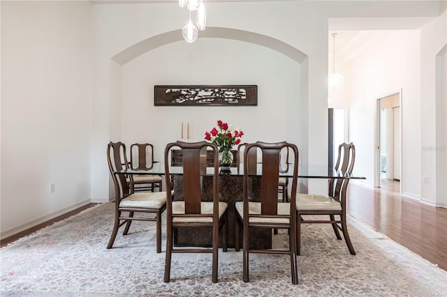 dining area with wood-type flooring