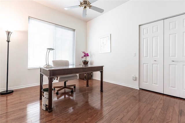 office space with ceiling fan, wood-type flooring, and a healthy amount of sunlight