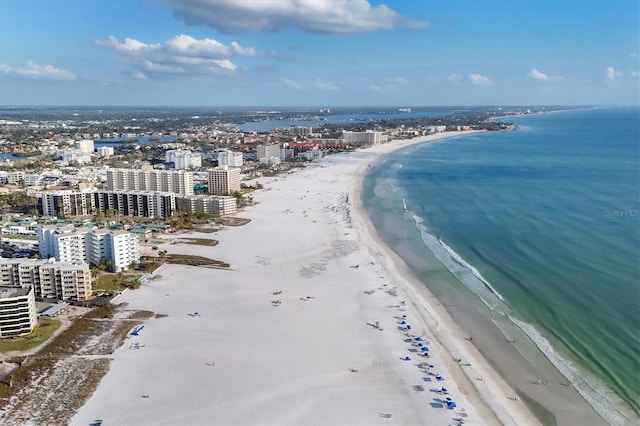 birds eye view of property with a view of city, a water view, and a view of the beach