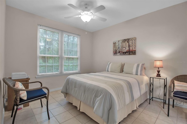 bedroom featuring light tile patterned flooring and ceiling fan