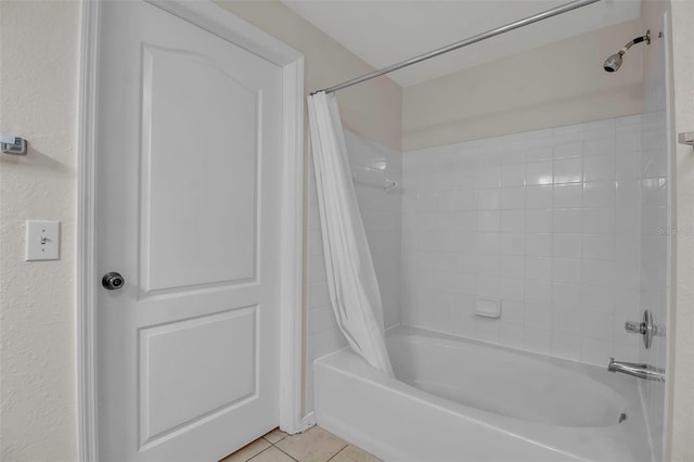 bathroom with tile patterned floors and shower / tub combo with curtain