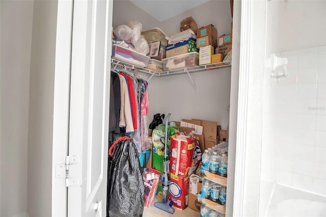 walk in closet with tile patterned floors