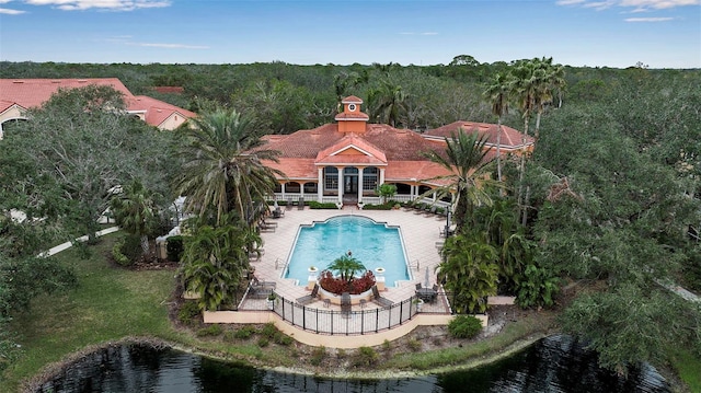 view of swimming pool with a patio area