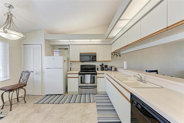 kitchen with sink, black appliances, white cabinets, a textured ceiling, and decorative light fixtures