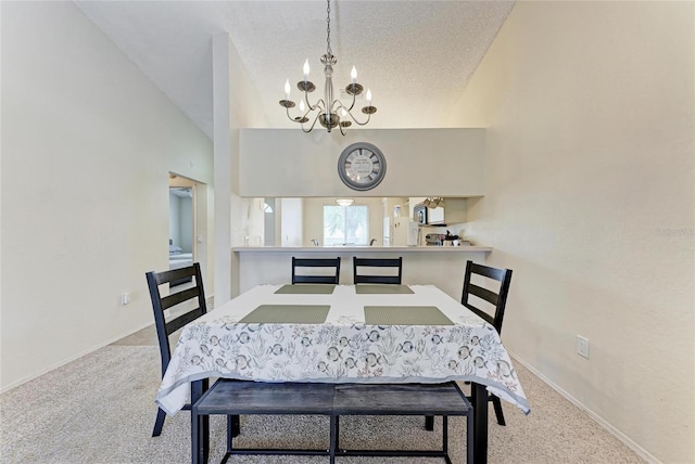 carpeted dining room featuring lofted ceiling, a chandelier, and a textured ceiling