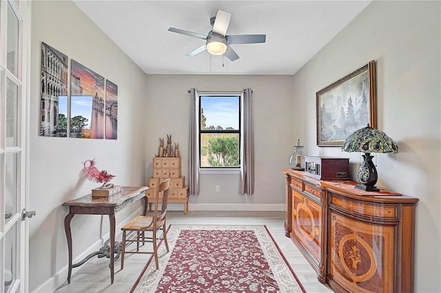 interior space featuring ceiling fan