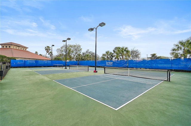 view of tennis court with basketball court