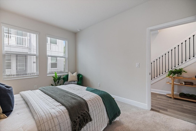 bedroom featuring carpet