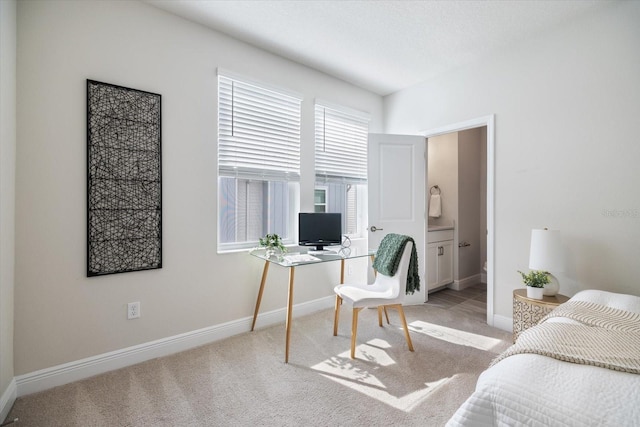 bedroom featuring light colored carpet