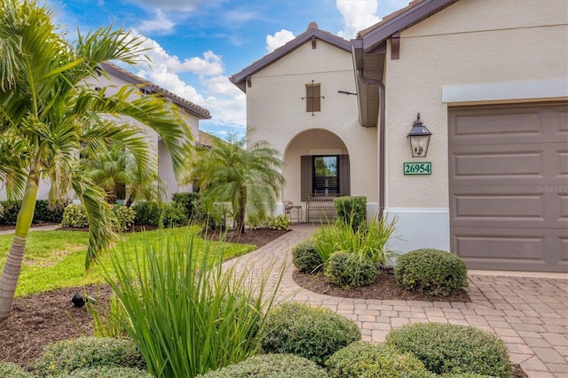 property entrance with a garage