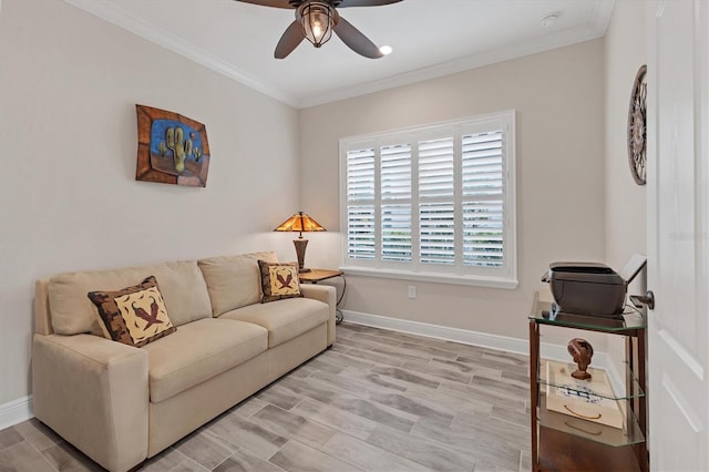 living room featuring ceiling fan, light hardwood / wood-style flooring, and ornamental molding