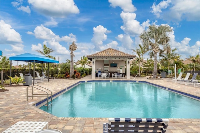 view of pool with a gazebo and a patio area