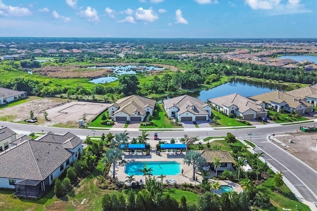 birds eye view of property featuring a water view