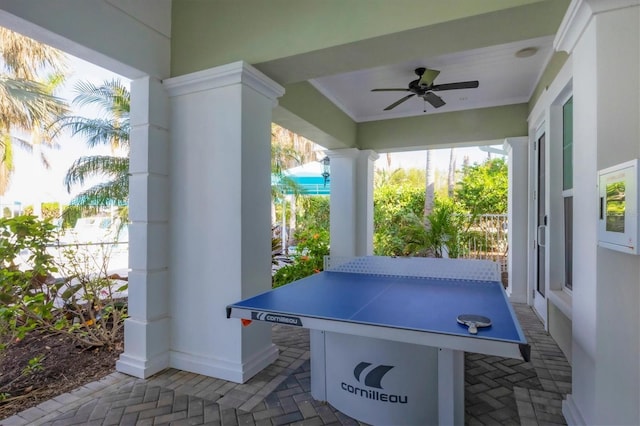 view of patio featuring ceiling fan