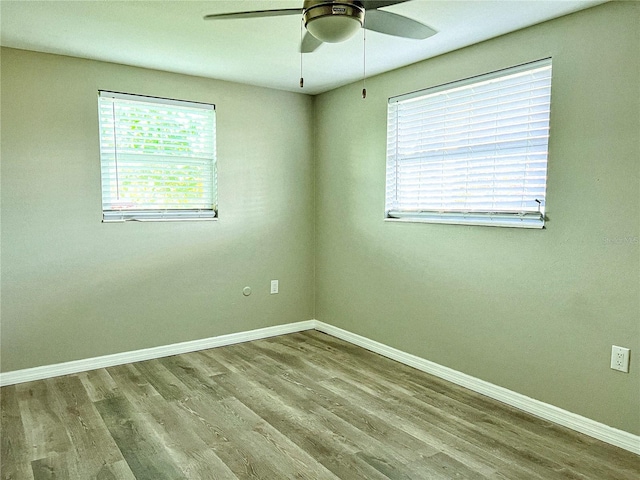 unfurnished room featuring ceiling fan and light hardwood / wood-style flooring