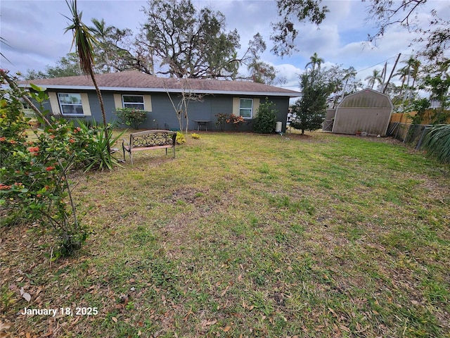 view of yard with a storage shed