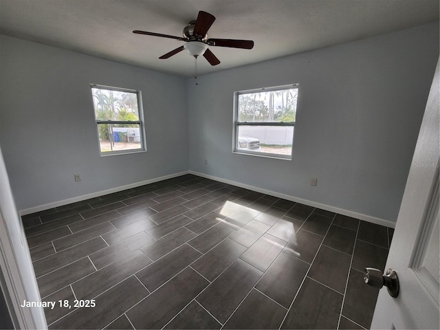 empty room with ceiling fan