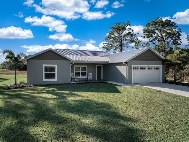 single story home with a garage and a front yard