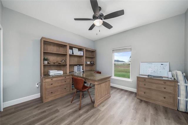 office with ceiling fan and wood-type flooring