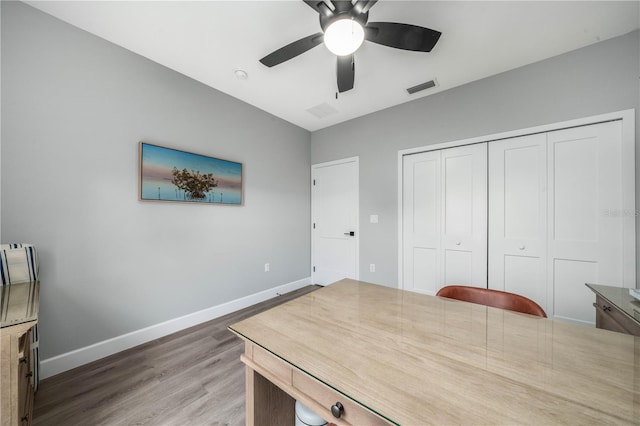 office featuring ceiling fan and wood-type flooring