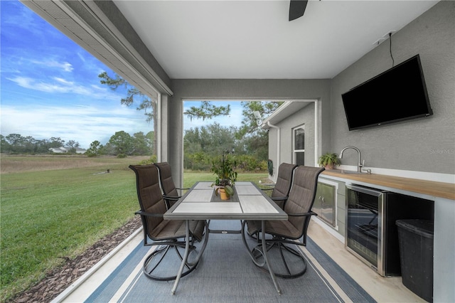 view of patio featuring sink and wine cooler