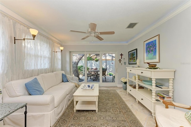 living room featuring ceiling fan and ornamental molding