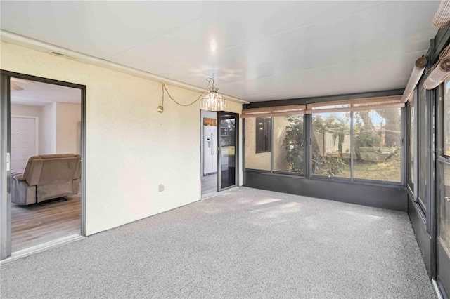 view of unfurnished sunroom