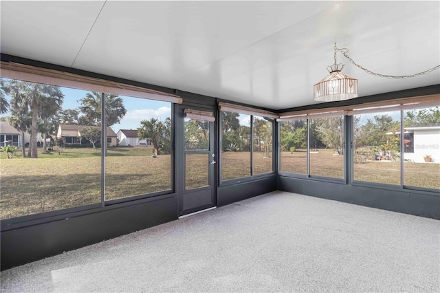 unfurnished sunroom with a healthy amount of sunlight