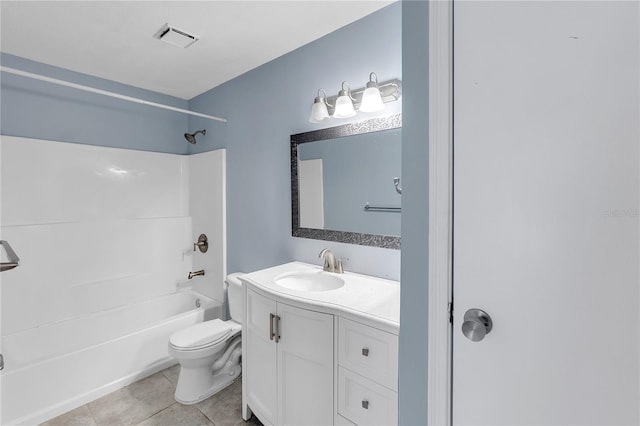 full bathroom featuring toilet, vanity,  shower combination, and tile patterned flooring