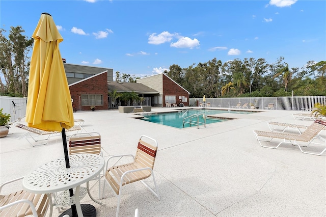 view of pool with a patio