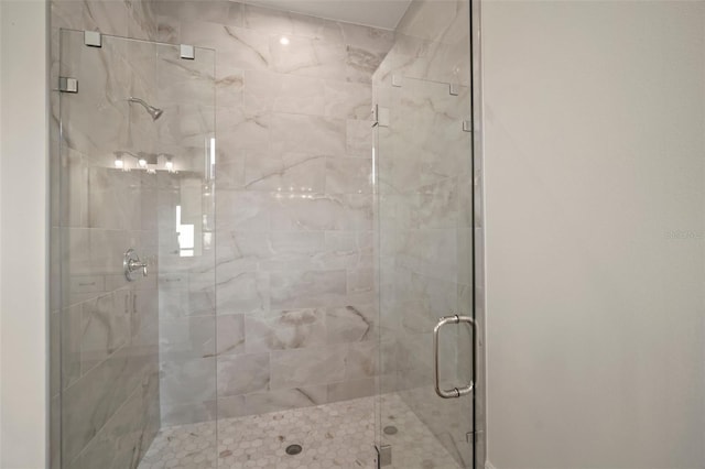 full bathroom with a shower stall
