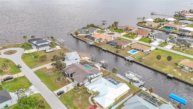 bird's eye view with a water view