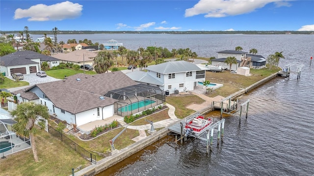 drone / aerial view with a water view